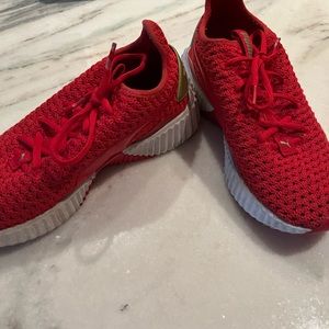 Super cute red Puma sneakers